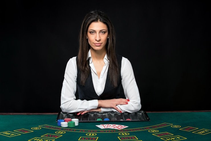 Live dealer casino table with cards and gaming chips